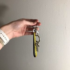 Wristlet that connects to a wallet or keys